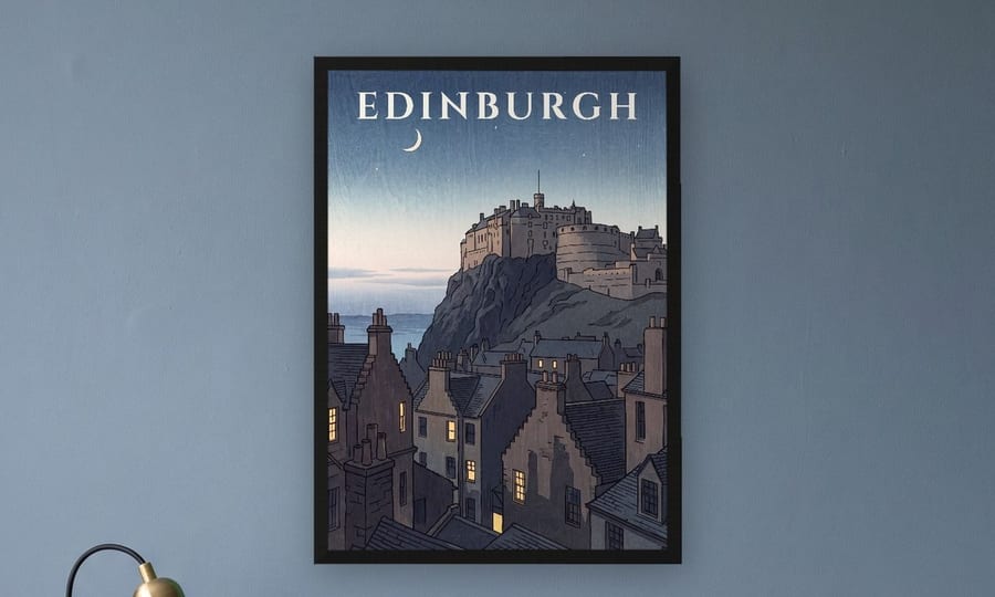 Edinburgh Castle at Dusk travel print framed in black on a blue wall