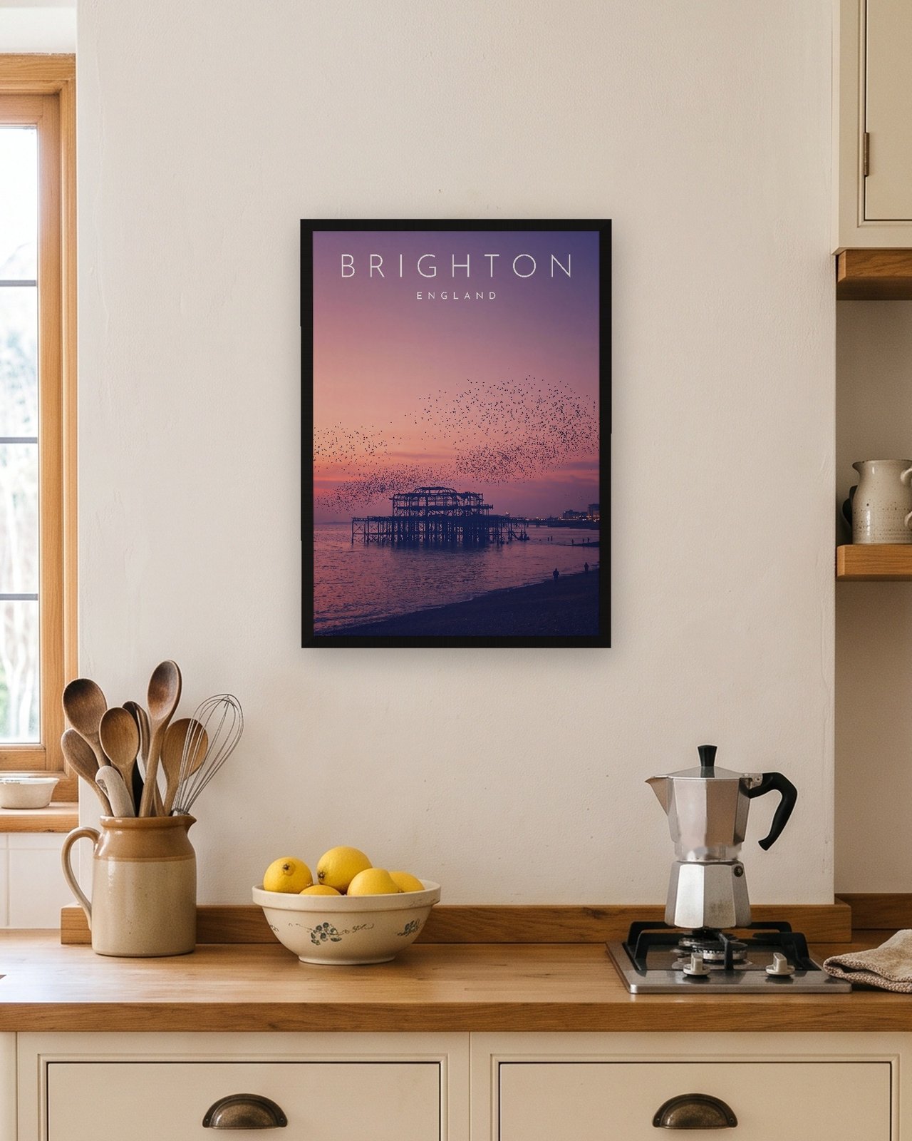 Brighton West Pier at Sunset print, black frame A3 in a bright kitchen