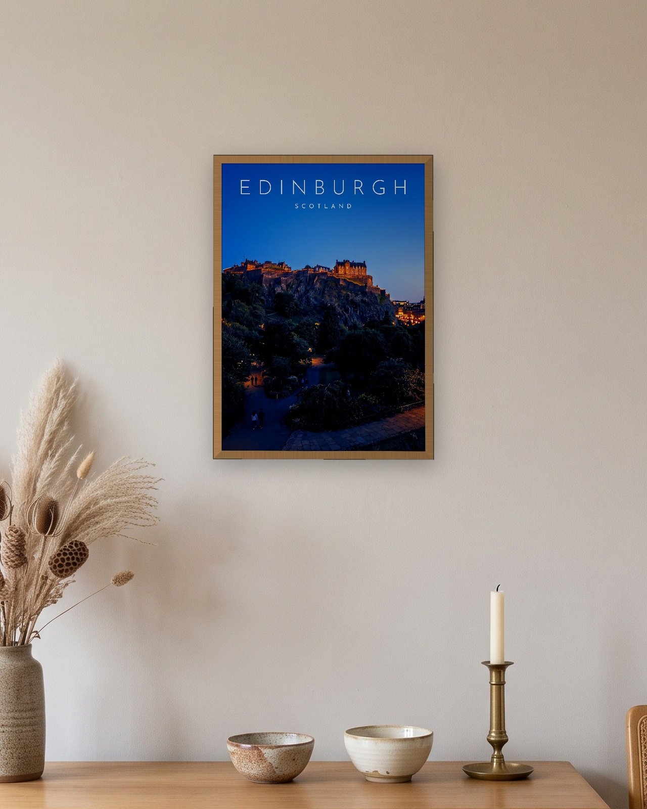 Edinburgh Castle at Blue Hour print, natural oak frame A3 above an oak sideboard