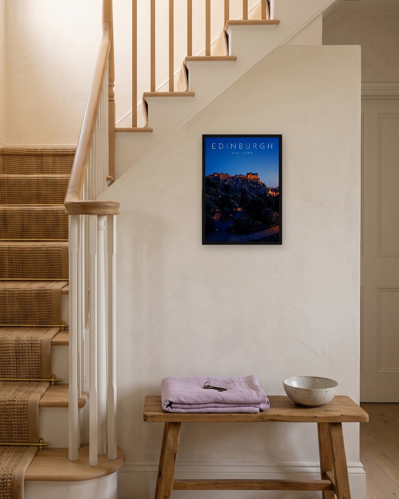 Edinburgh Castle at Blue Hour print, black frame A3 on a staircase wall