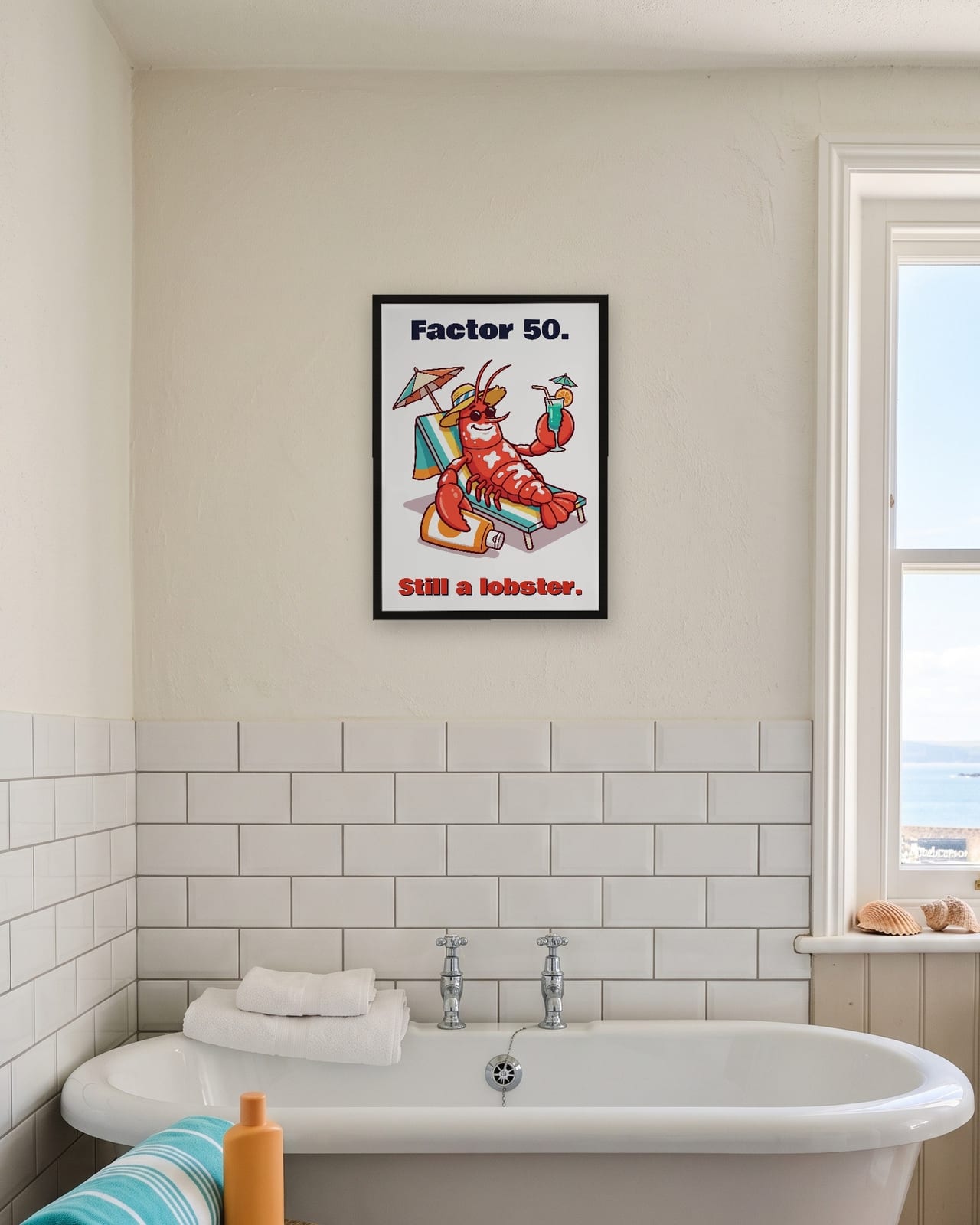 Factor 50 Still a Lobster print, black frame A3 in a seaside bathroom