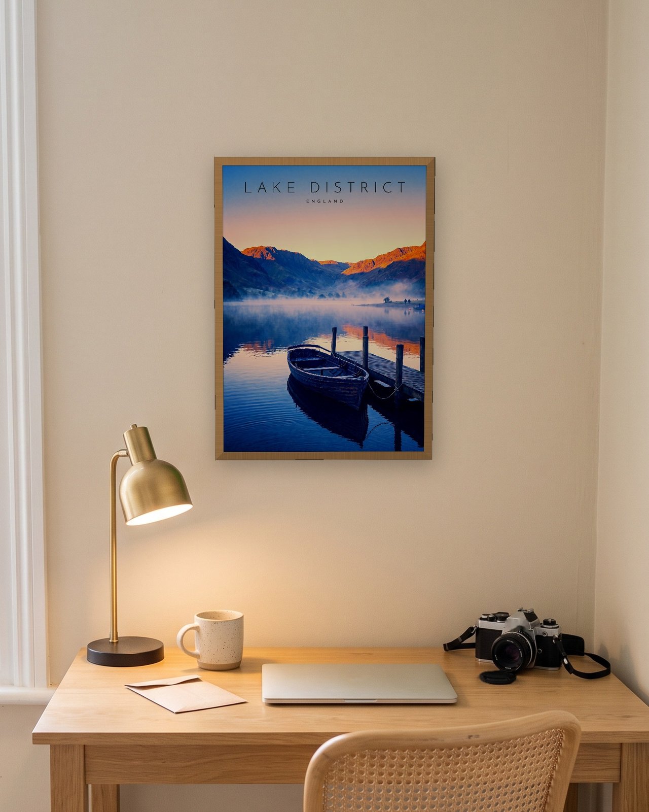 Derwentwater at Dawn print, natural oak frame A3 above a home office desk