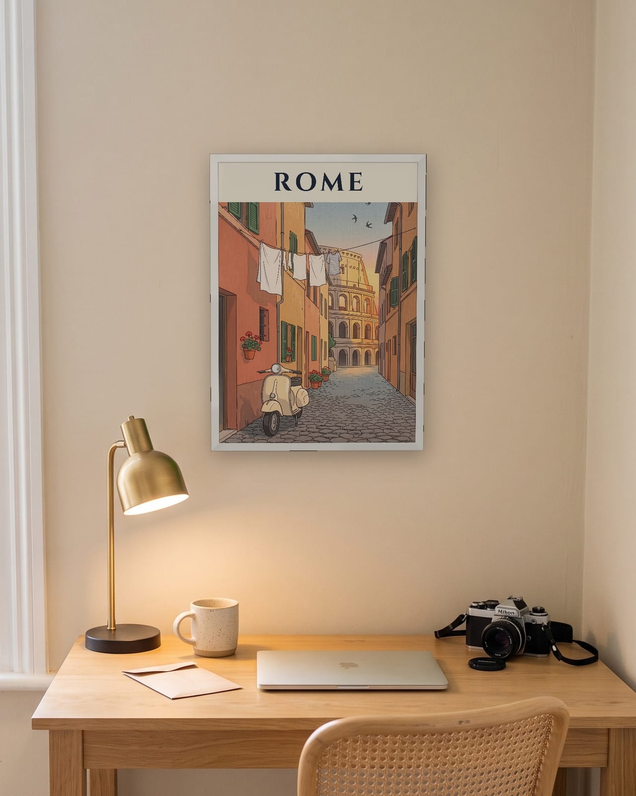 Rome Scooter and Colosseum print, white frame A3 above a home office desk