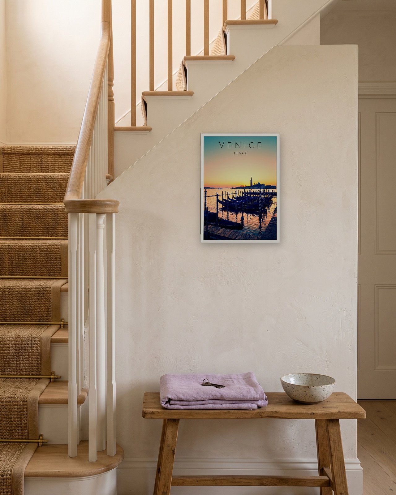 Venice Gondolas at Sunrise print, white frame A3 on a staircase wall