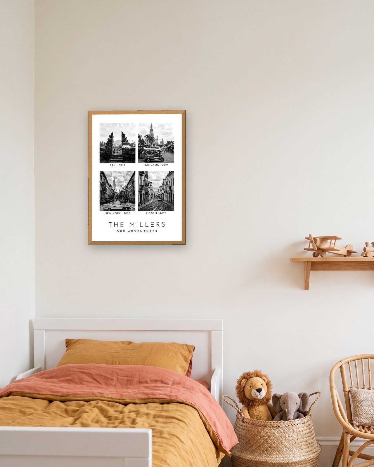 Our Family Adventures print in a natural oak A3 frame in a child's bedroom, four trips for The Millers