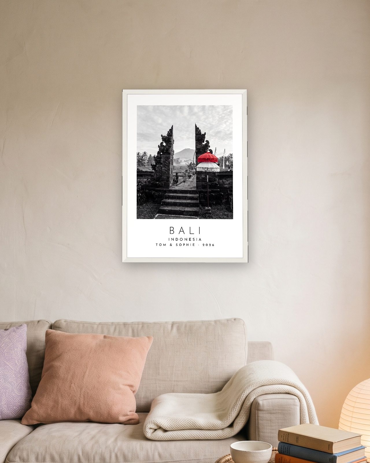 Our Trip Bali print: white frame A3 above a linen sofa, personalised TOM & SOPHIE · 2026
