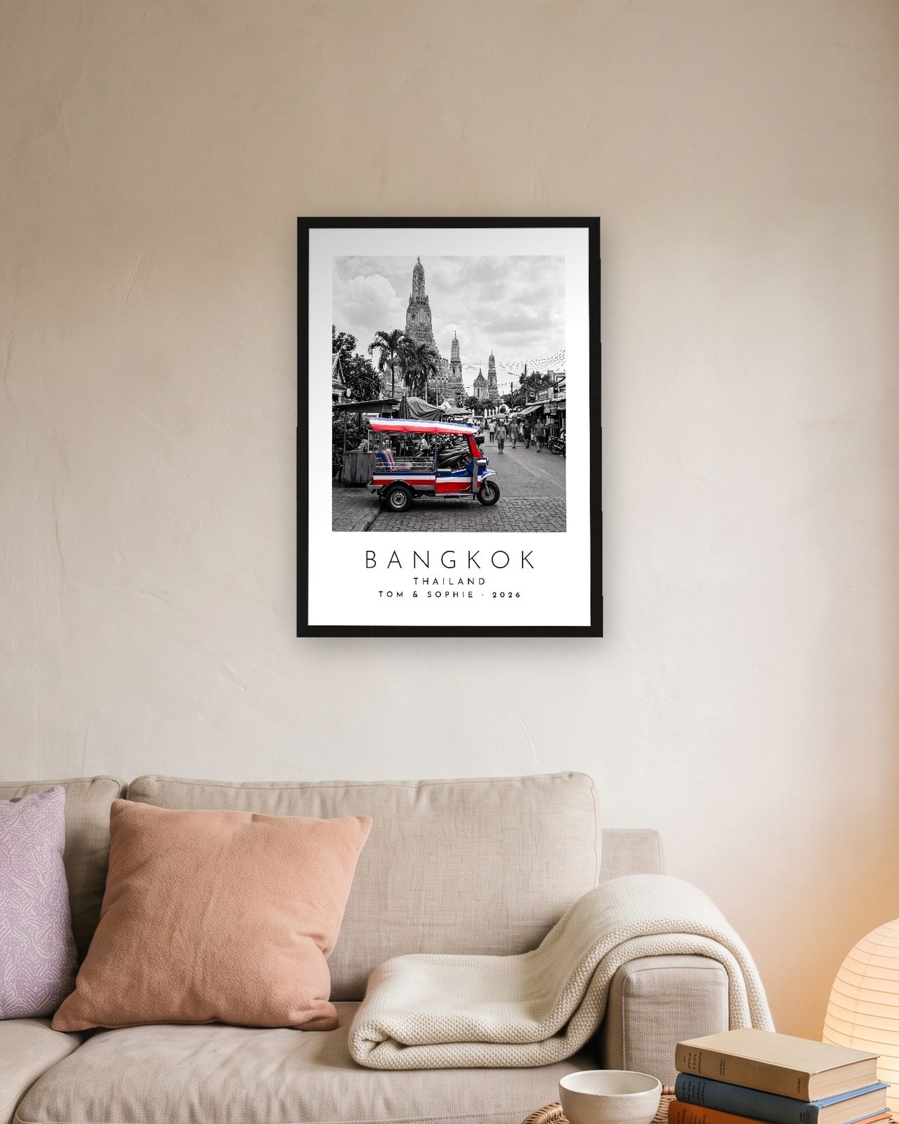 Our Trip Bangkok print: black frame A3 above a linen sofa, personalised TOM & SOPHIE · 2026
