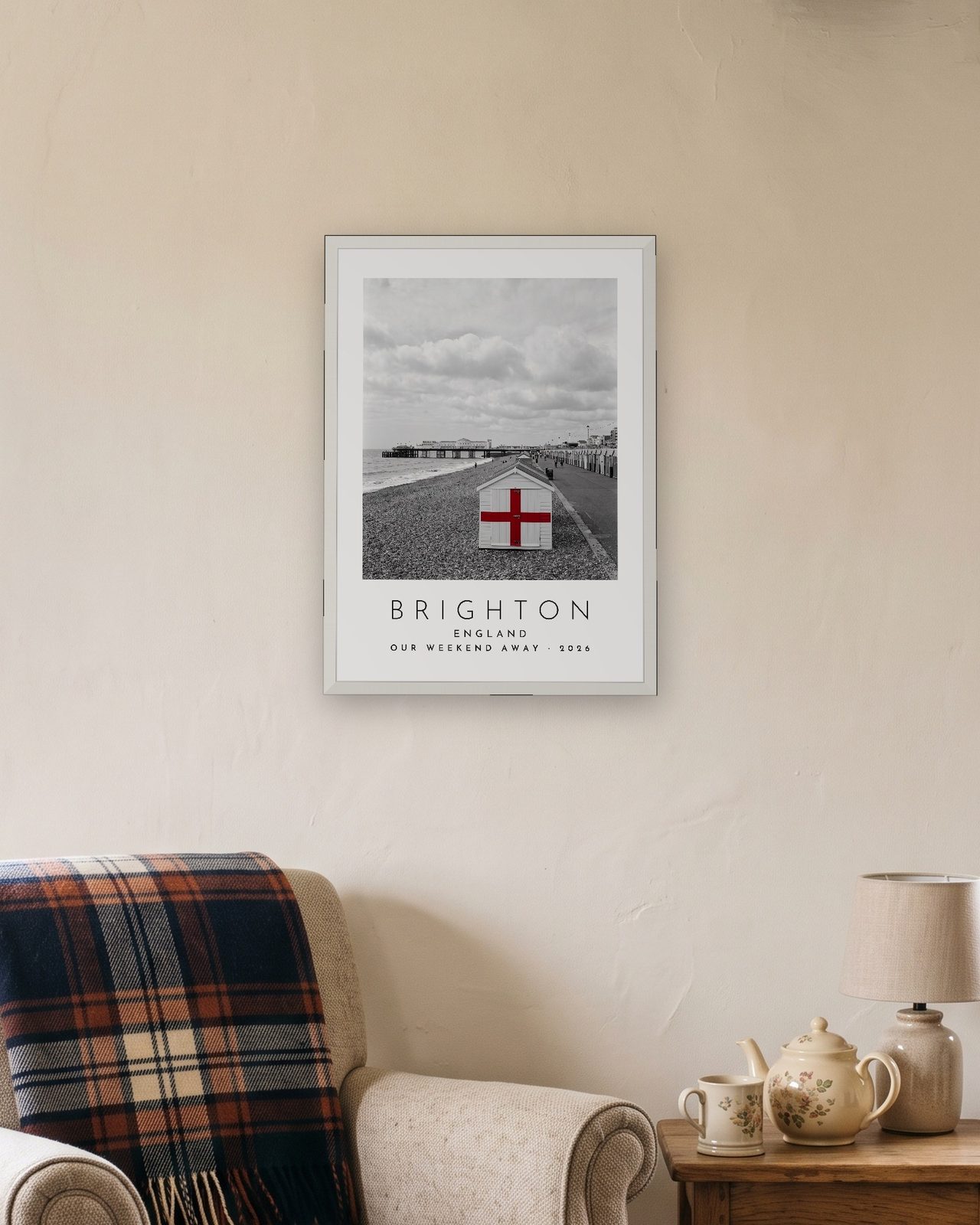 Our Trip Brighton print: white frame A3 in a cottage snug, personalised OUR WEEKEND AWAY · 2026