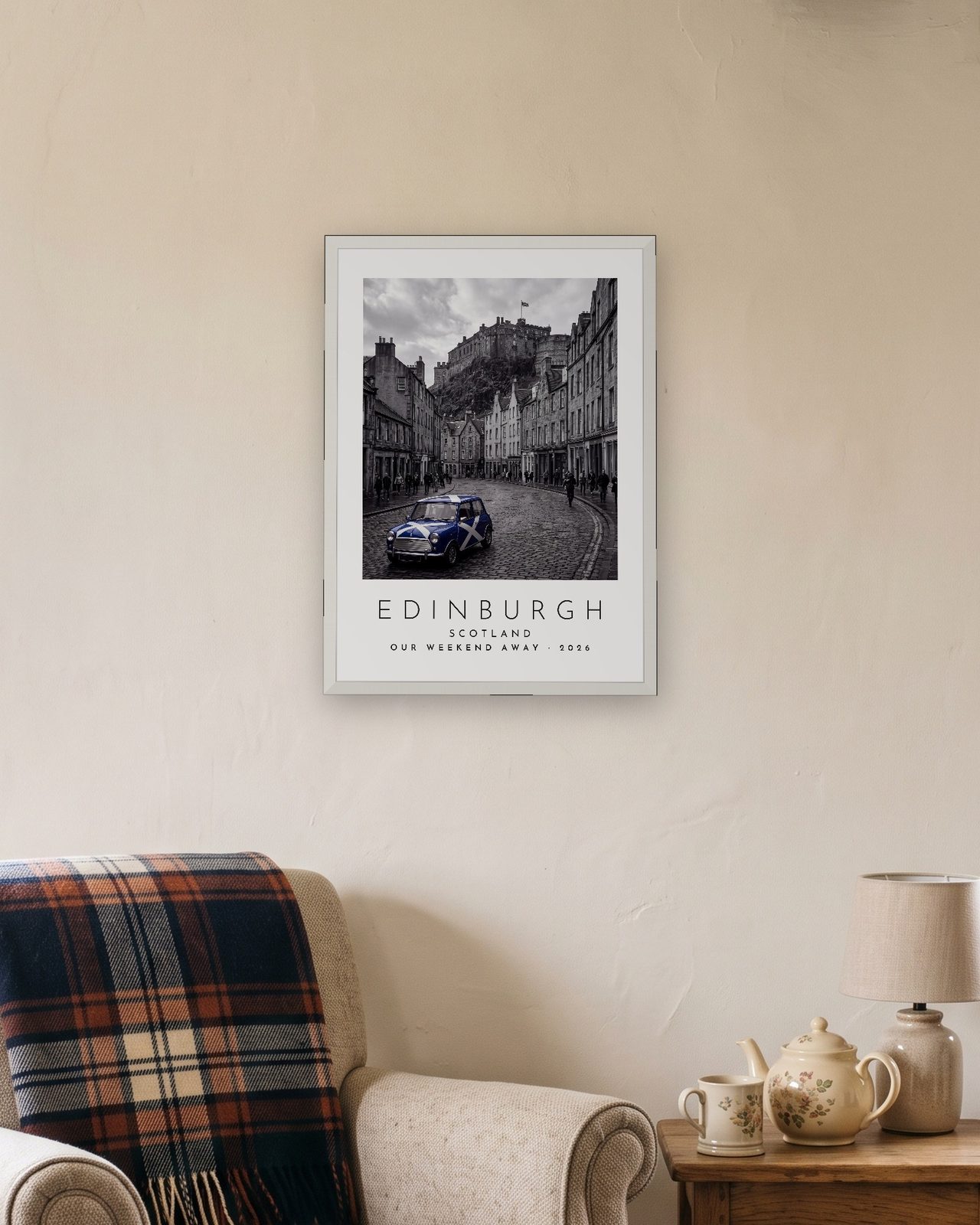 Our Trip Edinburgh print: white frame A3 in a cottage snug, personalised OUR WEEKEND AWAY · 2026