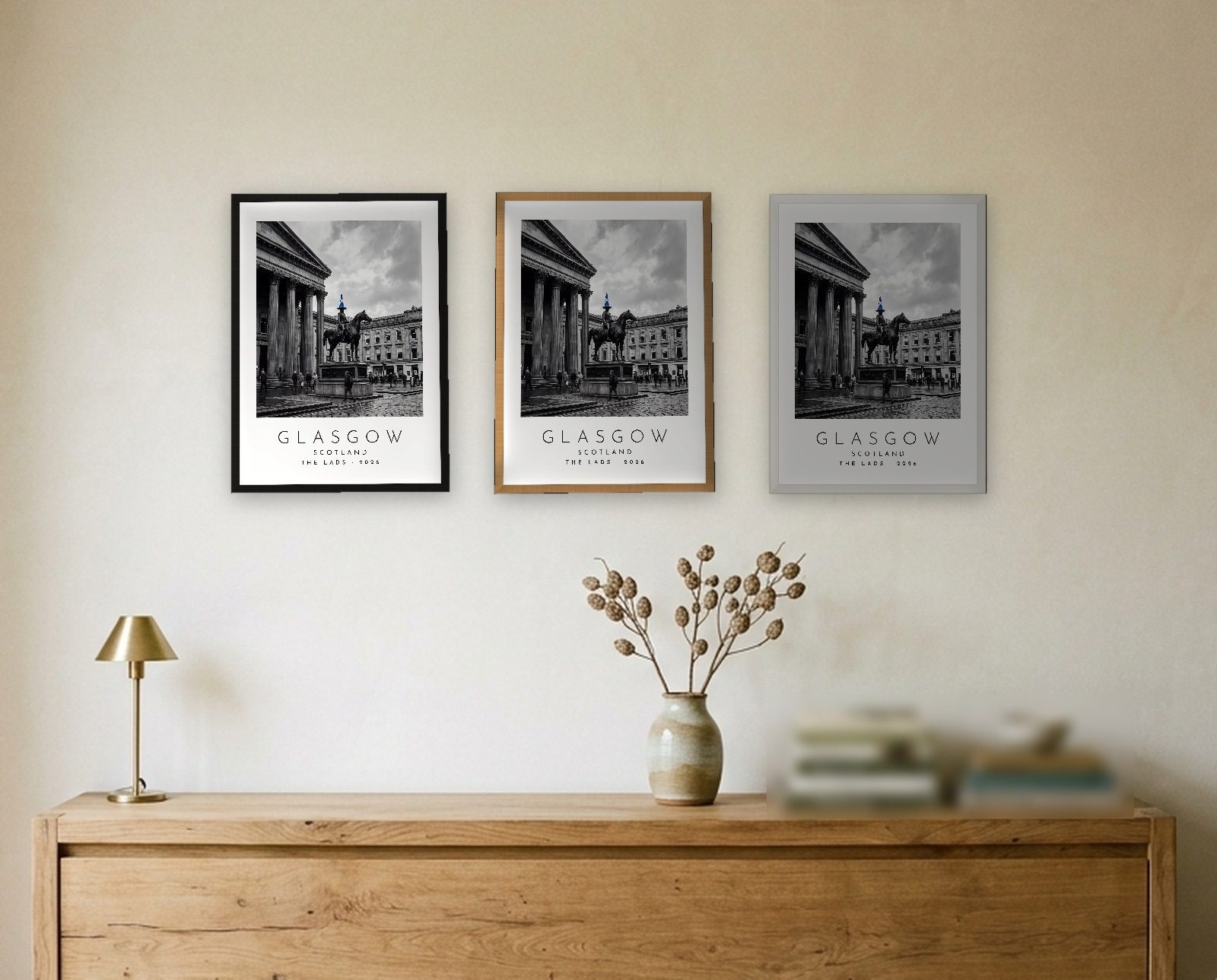 Our Trip Glasgow print: the three frame finishes side by side black natural oak white