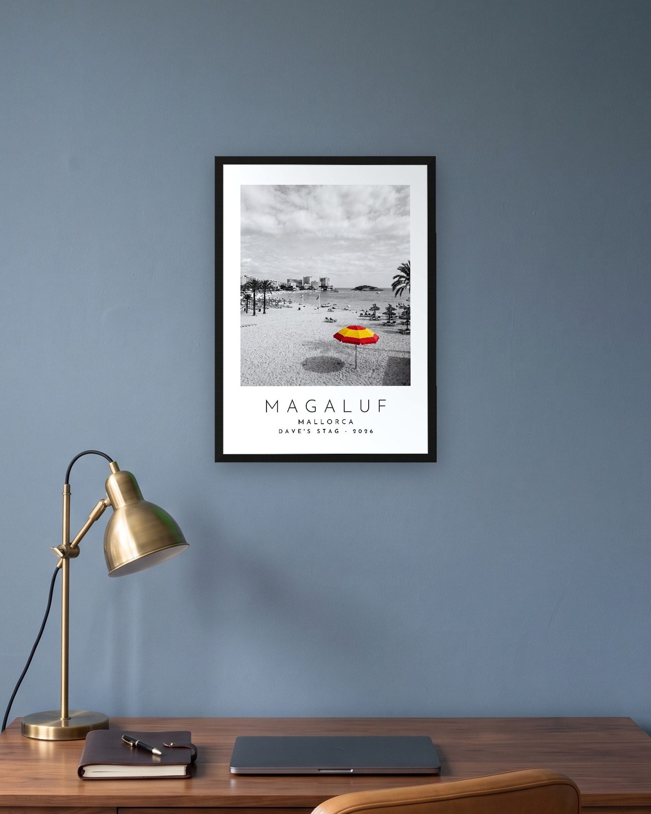 Our Trip Magaluf, Mallorca print: black frame A3 in a slate-blue study, personalised DAVE'S STAG · 2026