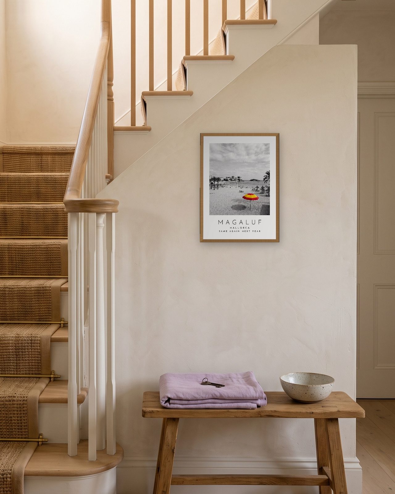Our Trip Magaluf, Mallorca print: natural oak frame A3 on a staircase wall, personalised SAME AGAIN NEXT YEAR