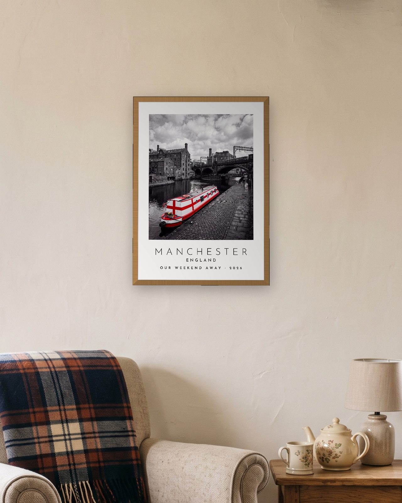 Our Trip Manchester print: natural oak frame A3 in a cottage snug, personalised OUR WEEKEND AWAY · 2026