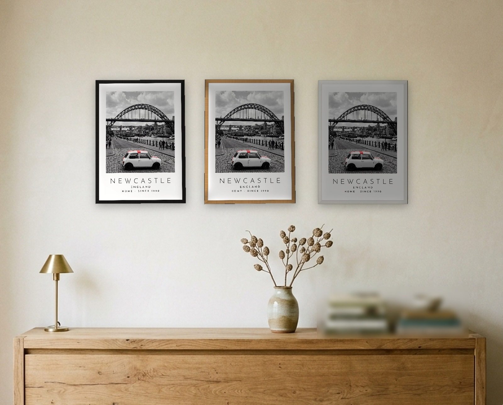 Our Trip Newcastle print: the three frame finishes side by side black natural oak white