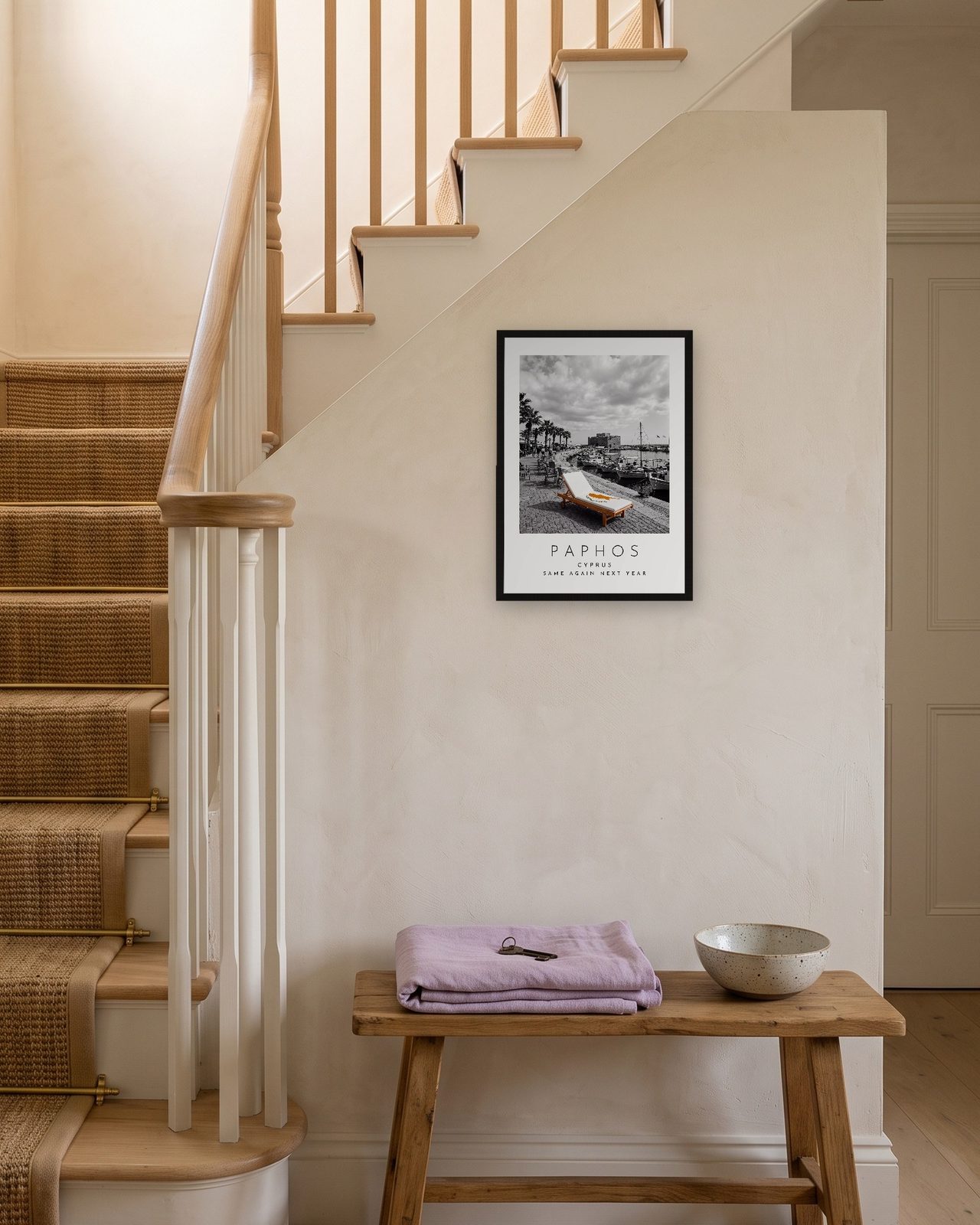 Our Trip Paphos print: black frame A3 on a staircase wall, personalised SAME AGAIN NEXT YEAR