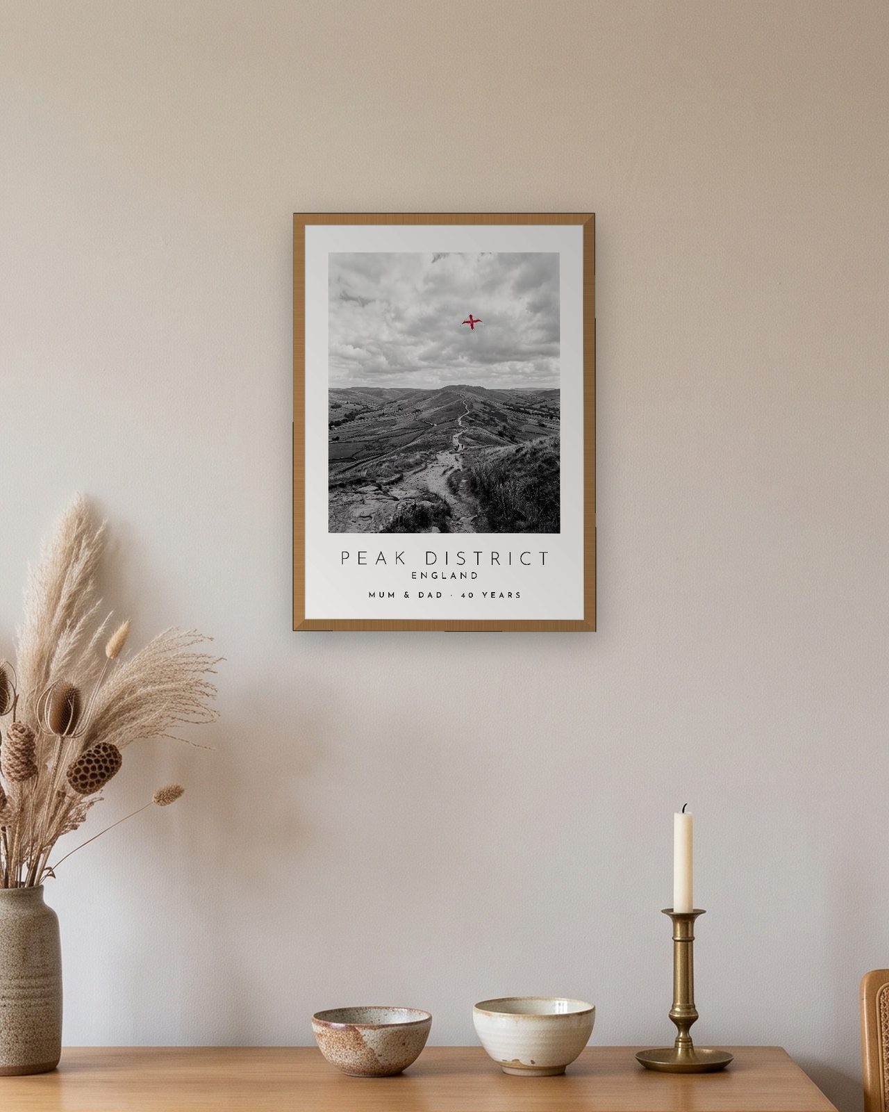 Our Trip Peak District print: natural oak frame A3 above an oak sideboard, personalised MUM & DAD · 40 YEARS
