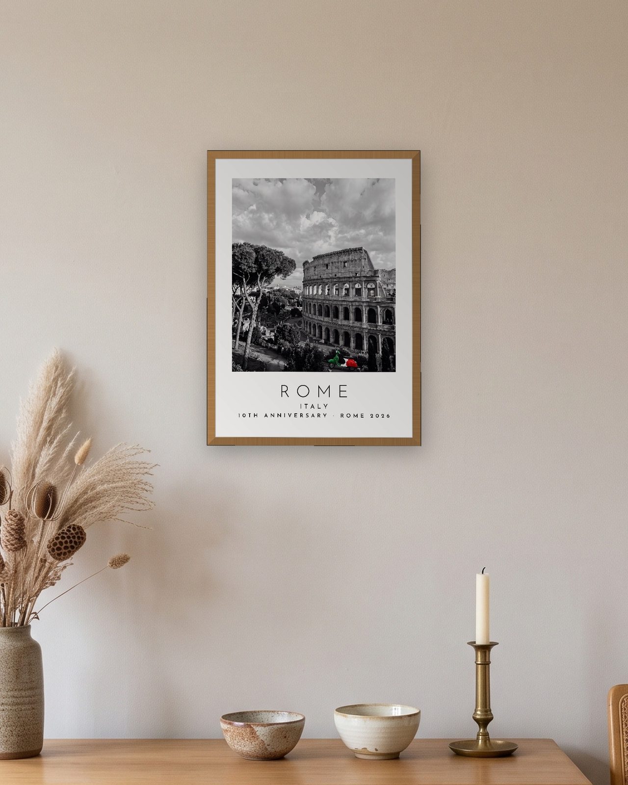 Our Trip Rome print: natural oak frame A3 above an oak sideboard, personalised 10TH ANNIVERSARY · ROME 2026