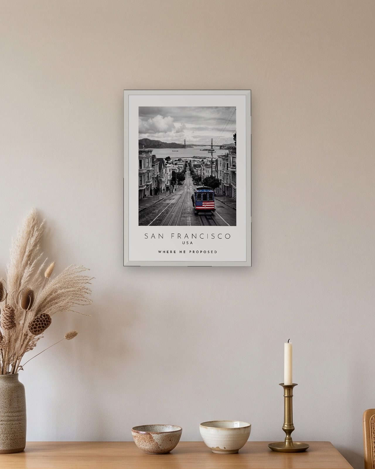 Our Trip San Francisco print: white frame A3 above an oak sideboard, personalised WHERE HE PROPOSED