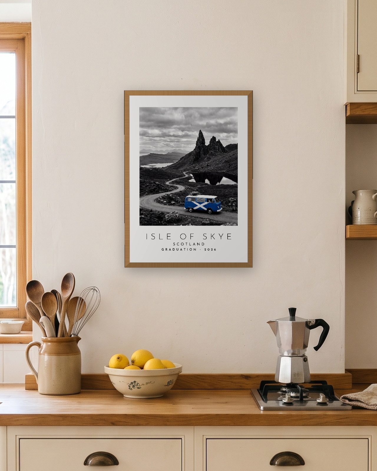 Our Trip Isle of Skye print: natural oak frame A3 in a bright kitchen, personalised GRADUATION · 2026