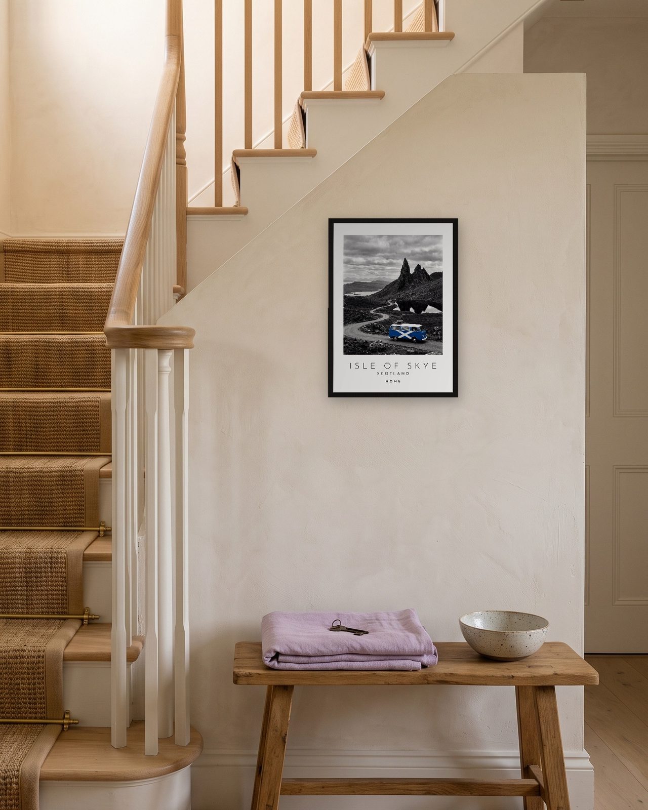 Our Trip Isle of Skye print: black frame A3 on a staircase wall, personalised HOME