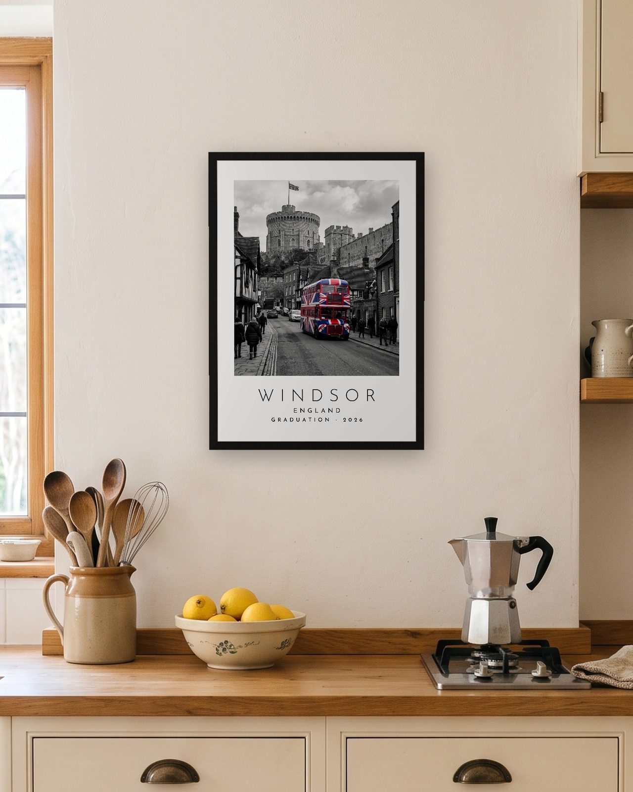 Our Trip Windsor print: black frame A3 in a bright kitchen, personalised GRADUATION · 2026