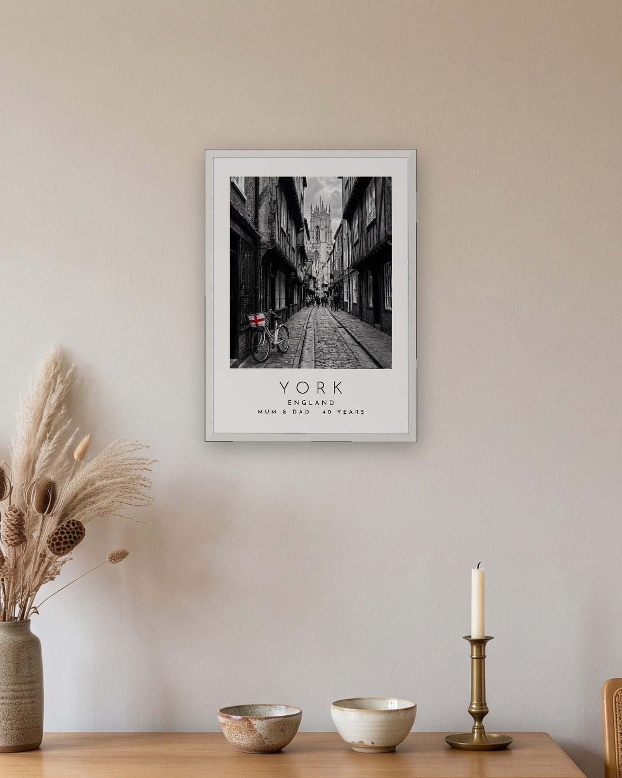 Our Trip York print: white frame A3 above an oak sideboard, personalised MUM & DAD · 40 YEARS
