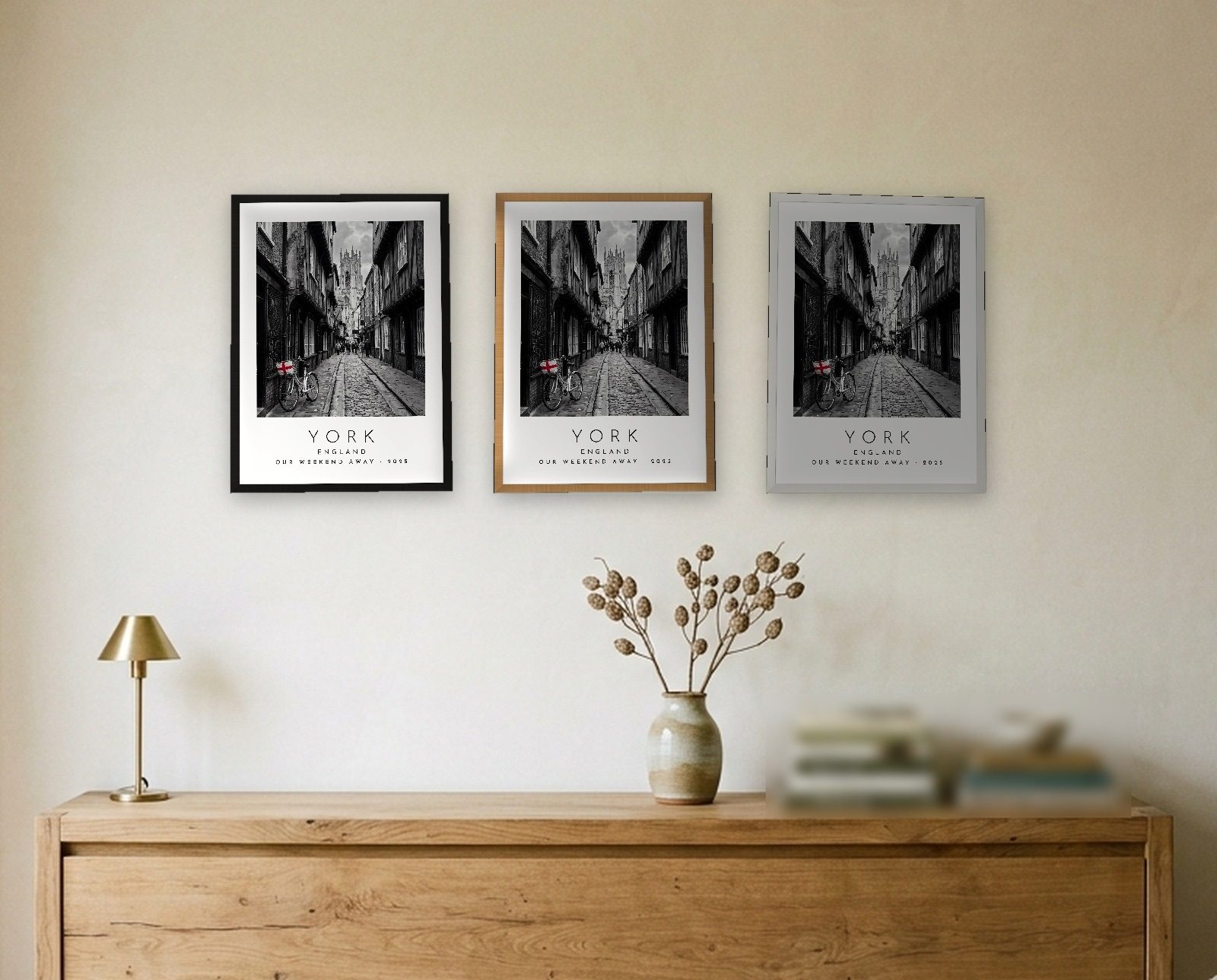 Our Trip York print: the three frame finishes side by side black natural oak white